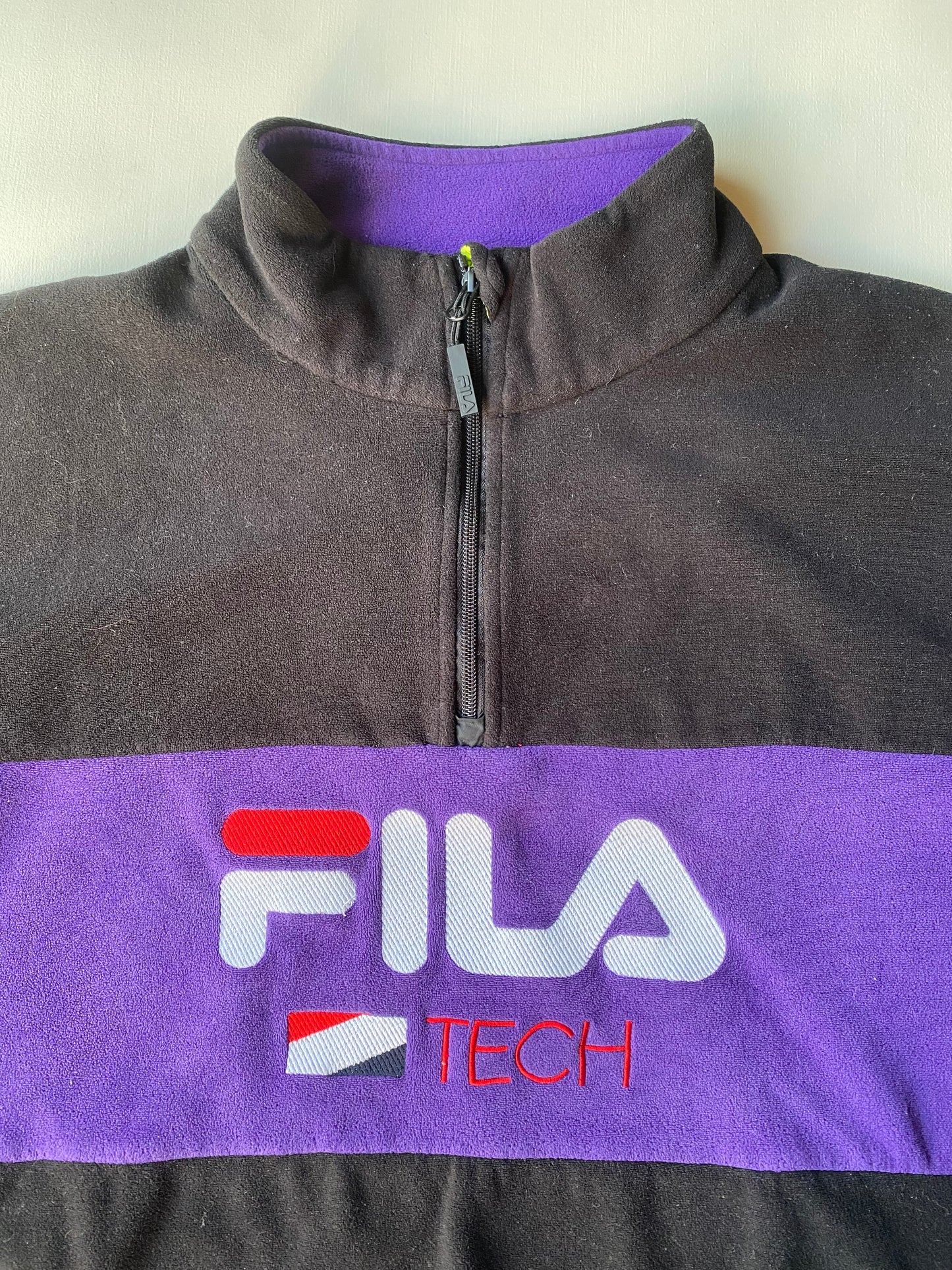 Polaire Fila Tech, noir et violet, M oversize