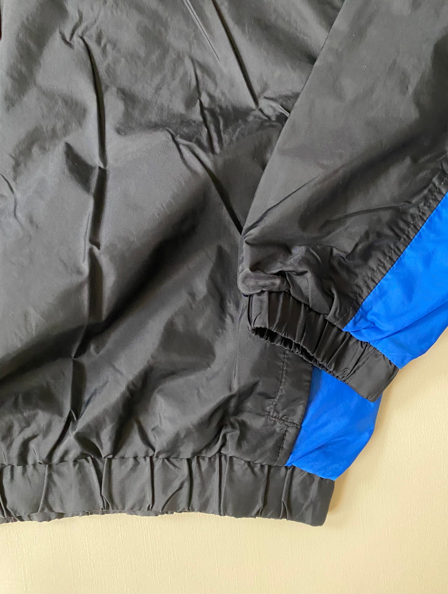 Veste coupe-vent / pluie à enfiler Nike, noir, S légèrement oversize