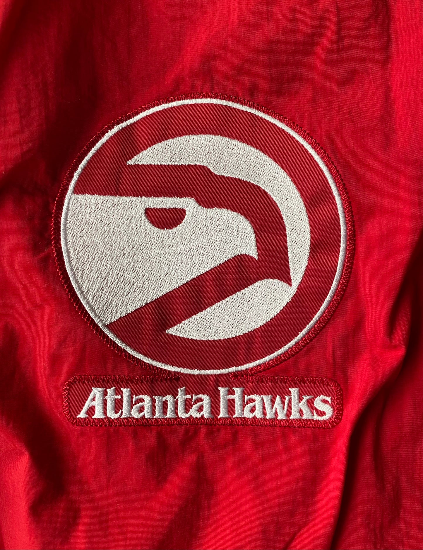 Veste coupe-vent / pluie Mitchell and Ness, Atlanta Hawks, Jaune/blanc/rouge, L