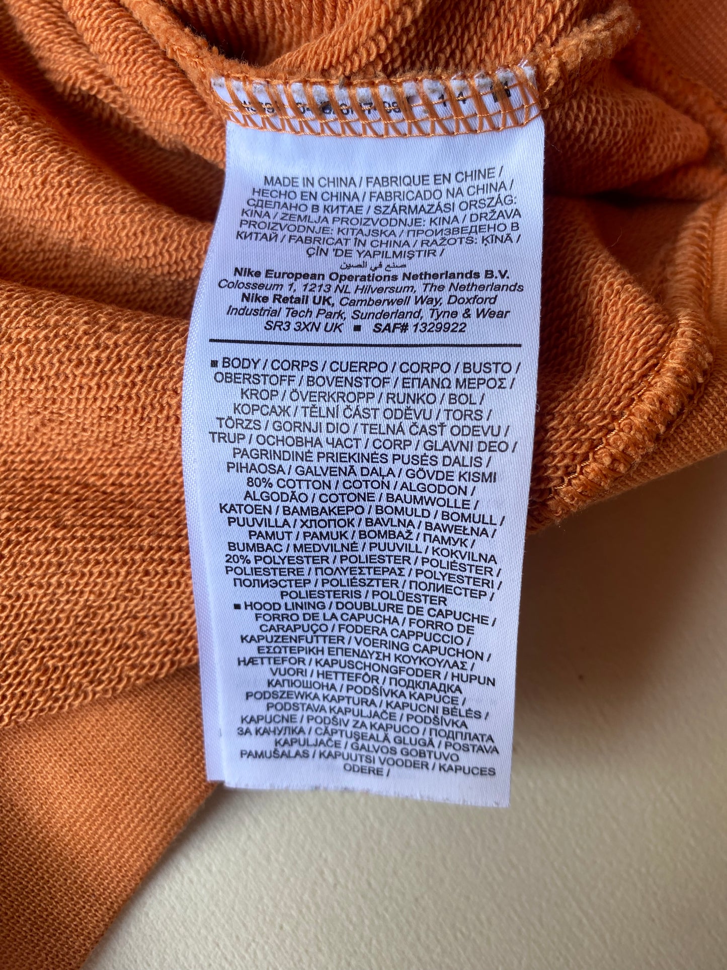 Pull à capuche Nike, pêche, M légèrement oversize