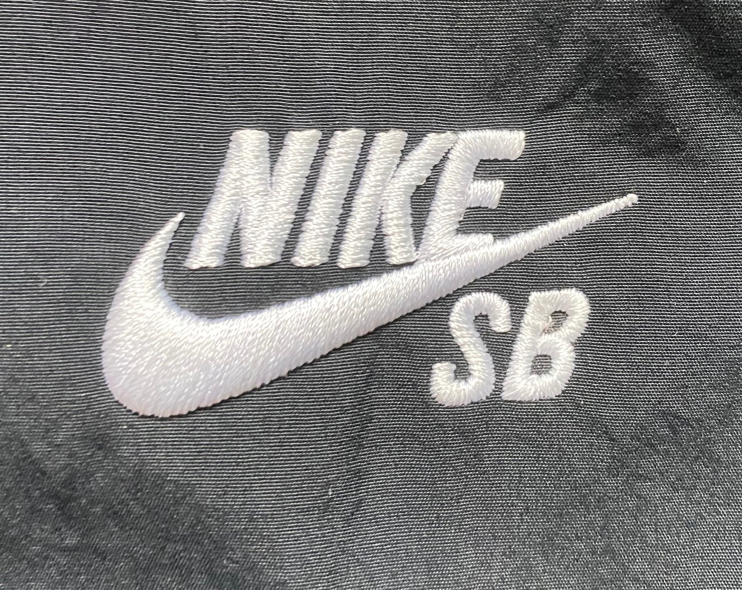 Veste coupe-vent / pluie Nike SB, noir, M