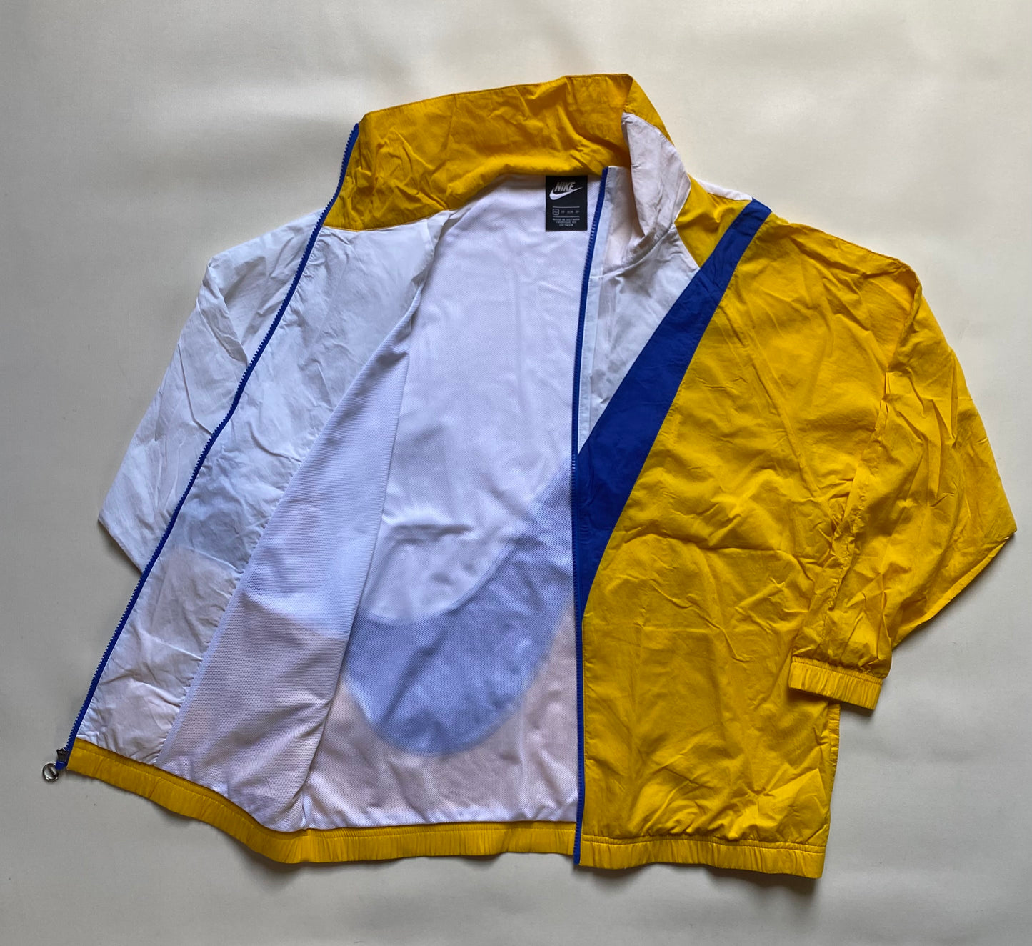 Veste coupe-vent / pluie Nike, Jaune / blanc / bleu, M