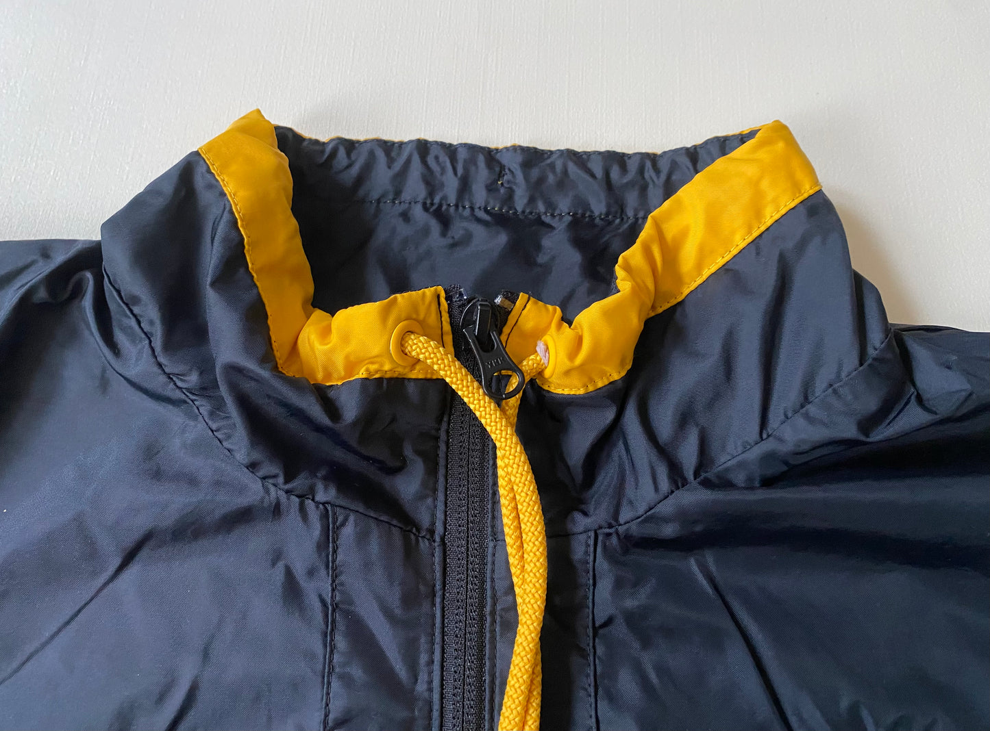 Veste coupe-vent / pluie à enfiler Nike, noir, S légèrement oversize