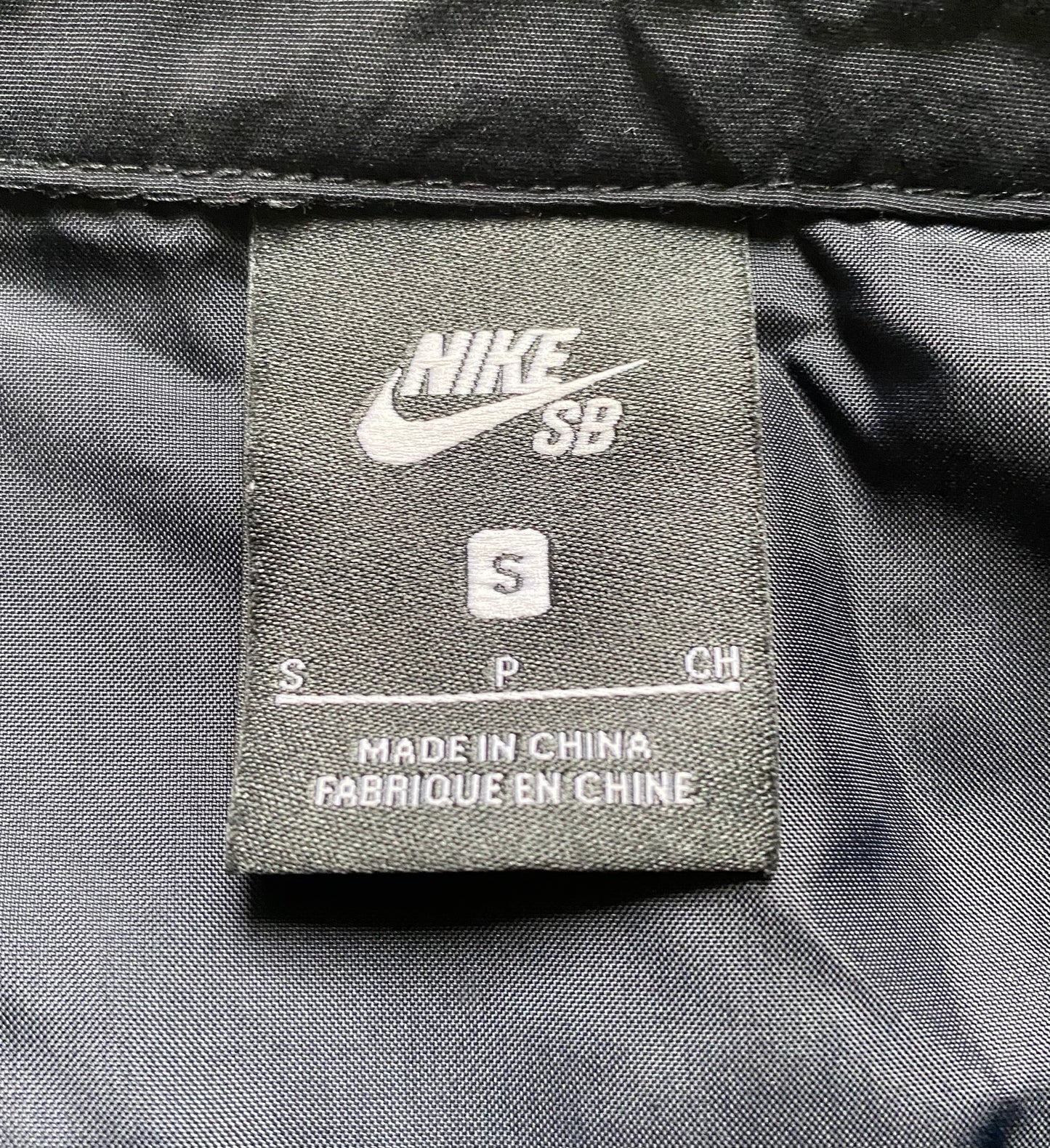 Veste coupe-vent / pluie Nike SB, noir, M