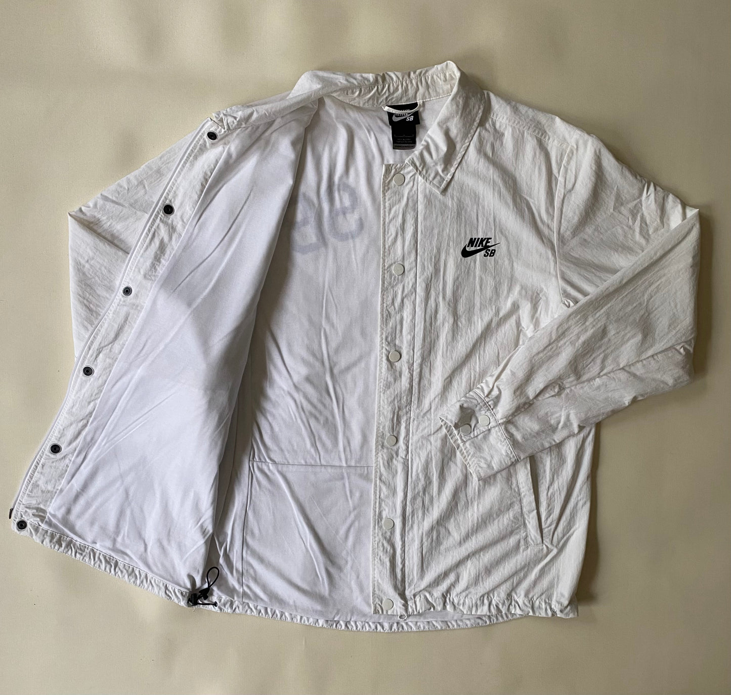 Veste coupe-vent / pluie Nike SB, blanc, M