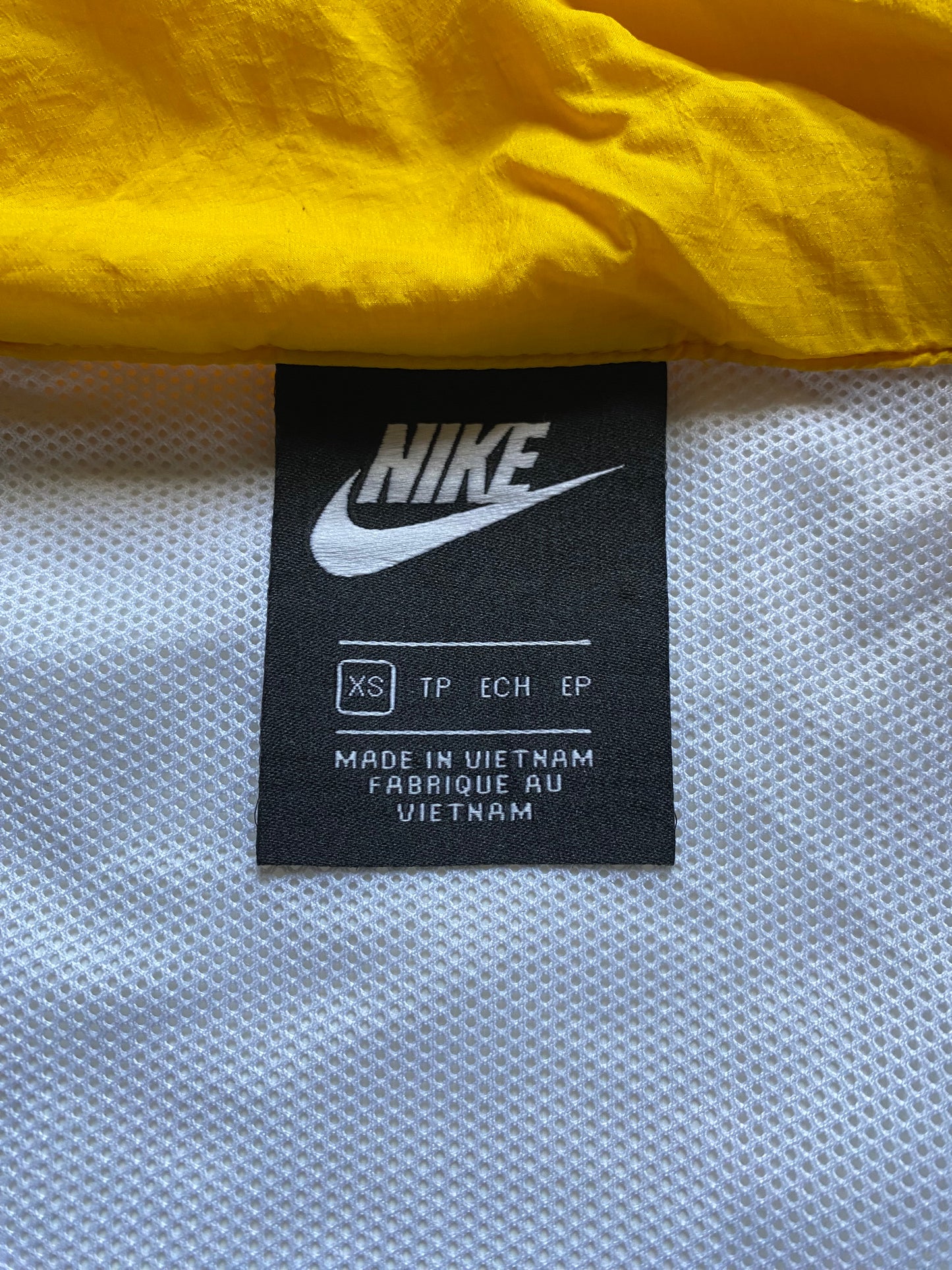 Veste coupe-vent / pluie Nike, Jaune / blanc / bleu, M