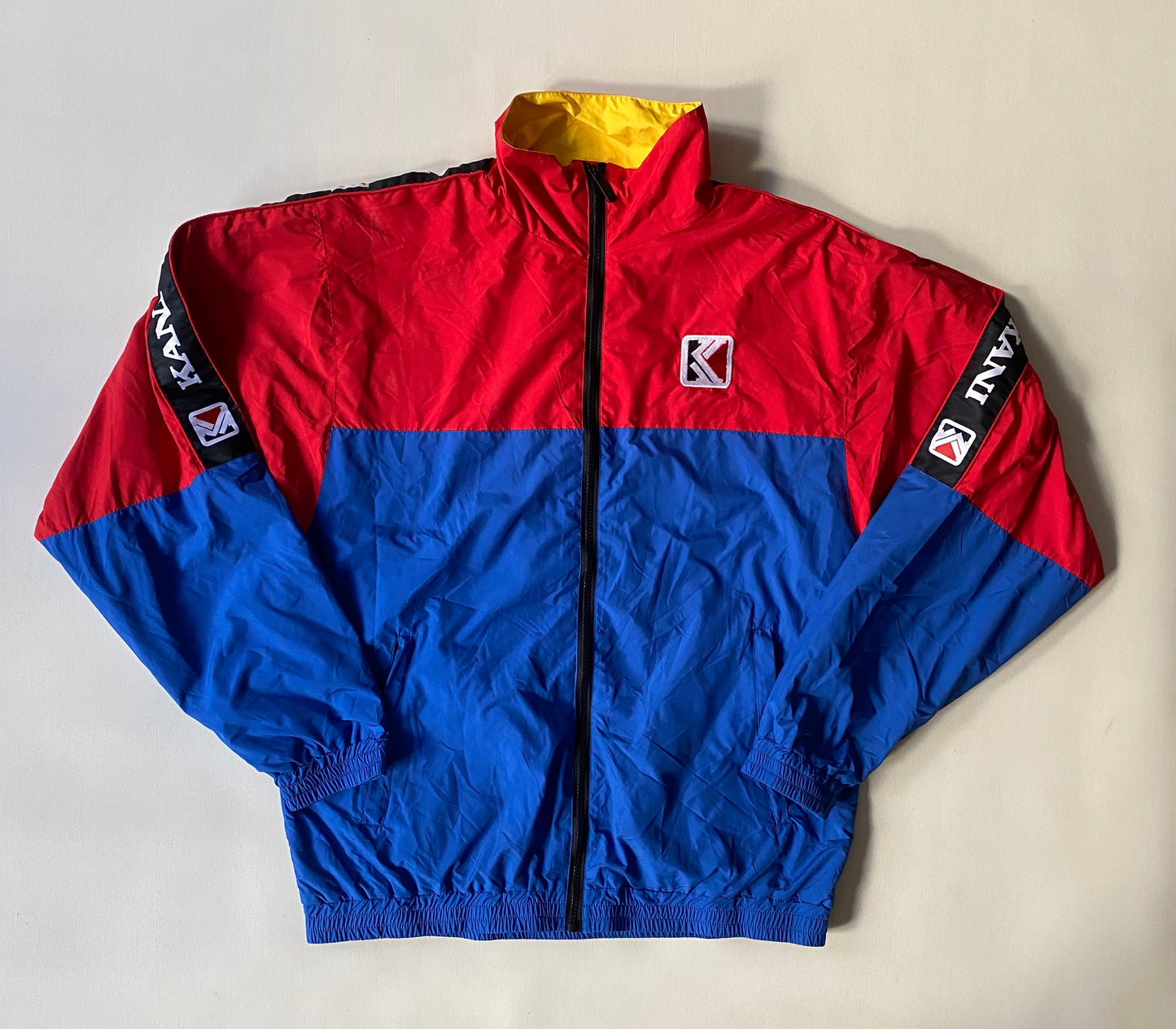 Veste coupe-vent Karl Kani, rouge et bleu, M légèrement oversize