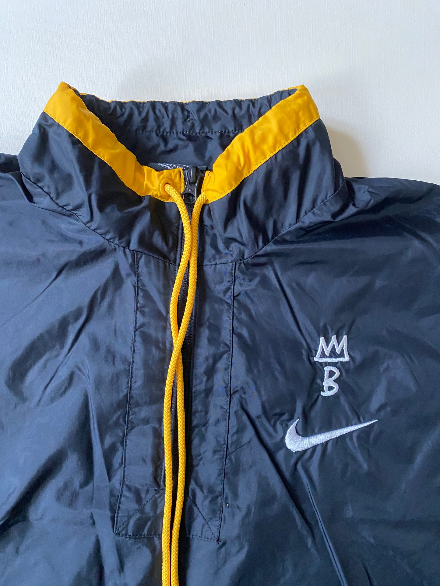 Veste coupe-vent / pluie à enfiler Nike, noir, S légèrement oversize