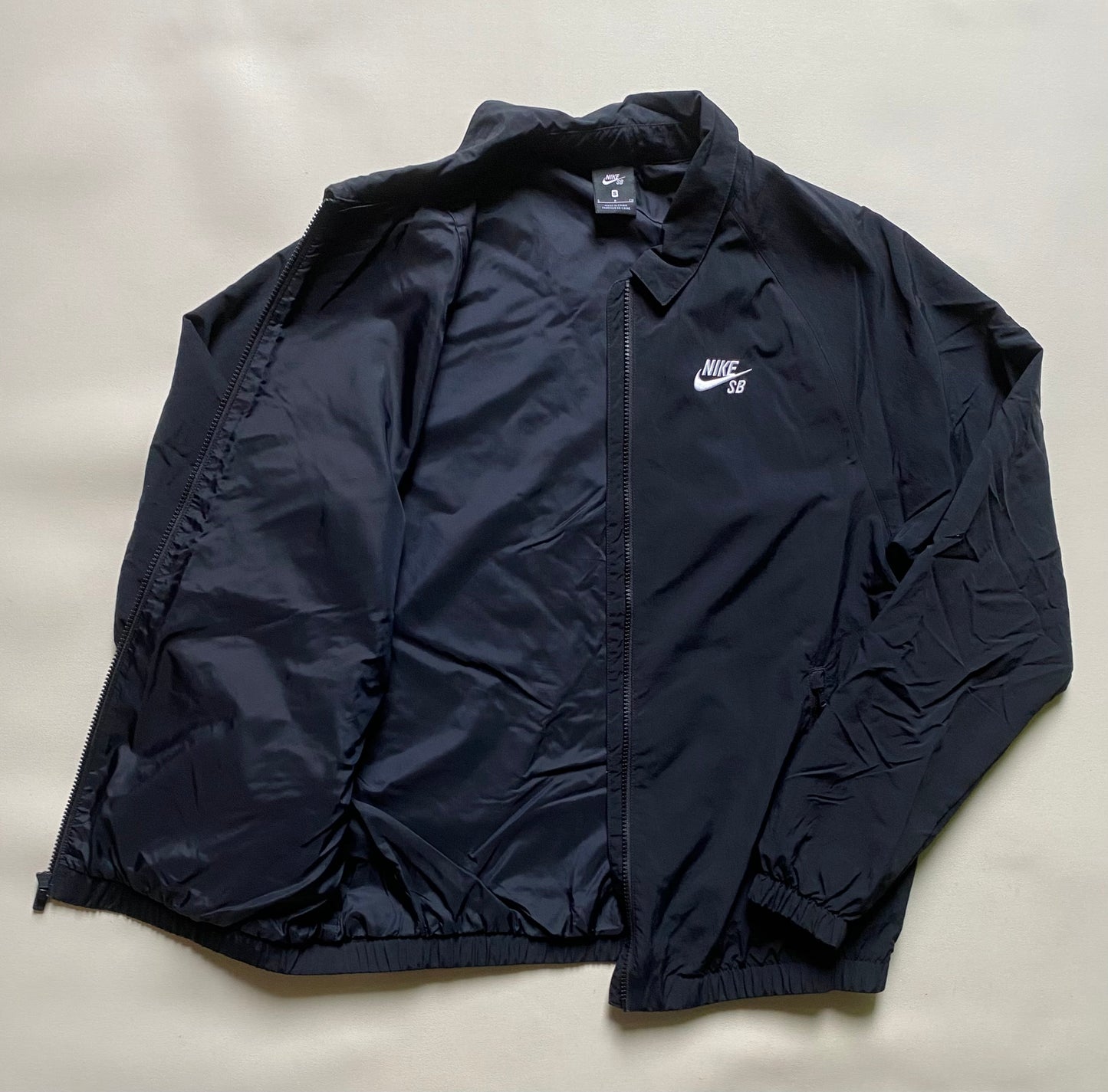 Veste coupe-vent / pluie Nike SB, noir, M