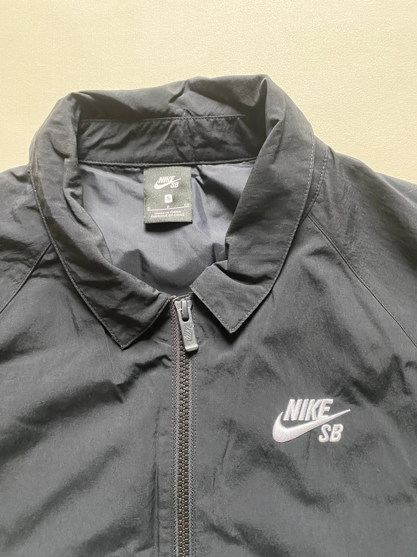 Veste coupe-vent / pluie Nike SB, noir, M