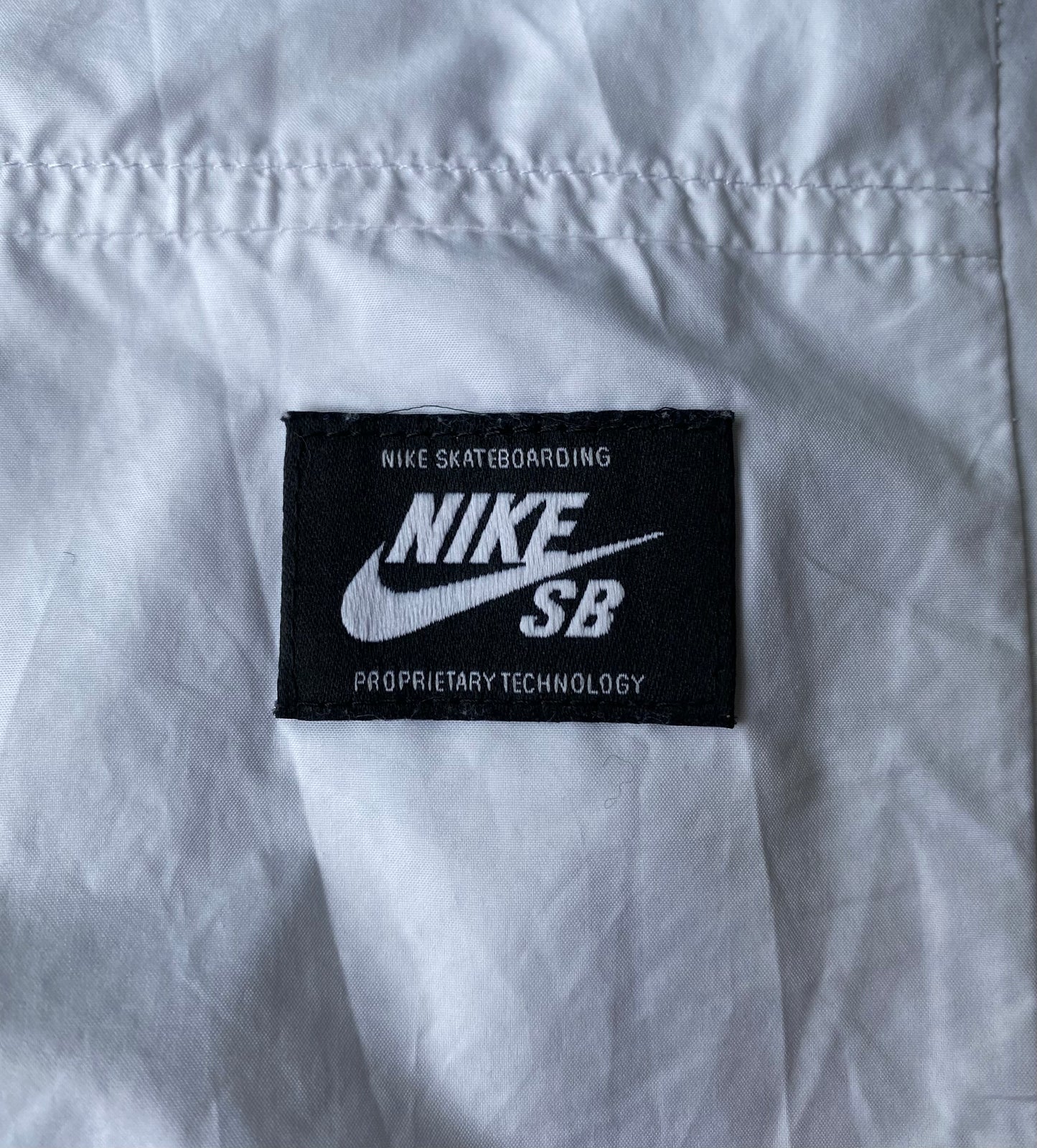 Veste coupe-vent / pluie Nike SB, blanc, M oversize