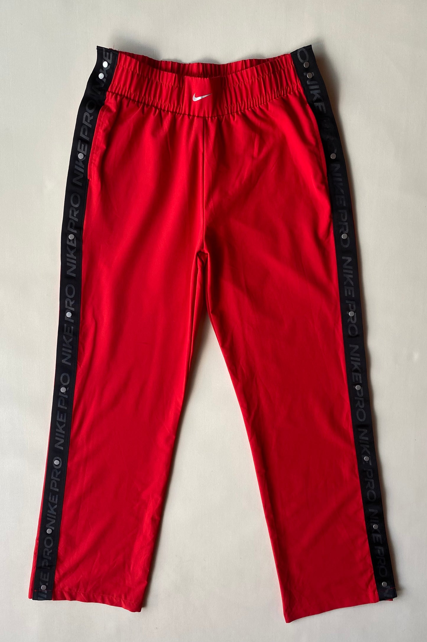 Pantalon jogging pression Nike Pro, Rouge / noir, M cintré (36-38)