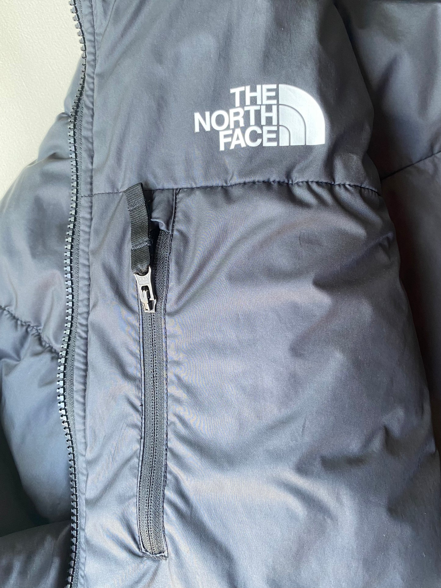 Doudoune réversible The North Face, noire, XL boys (M adulte)