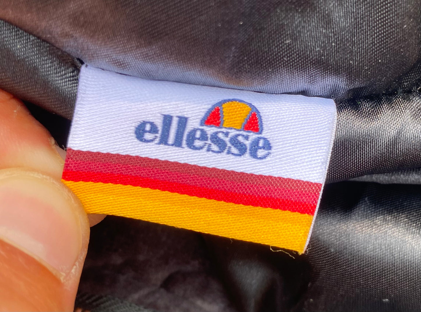 Doudoune Ellesse velours côtelé, noire, M légèrement oversize