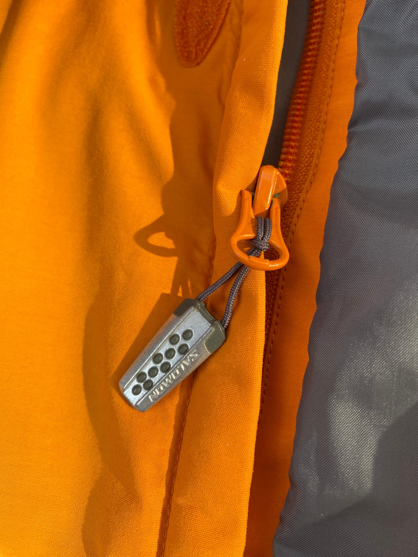 Veste goretex Salomon, orange/blanc/gris, M légèrement oversize