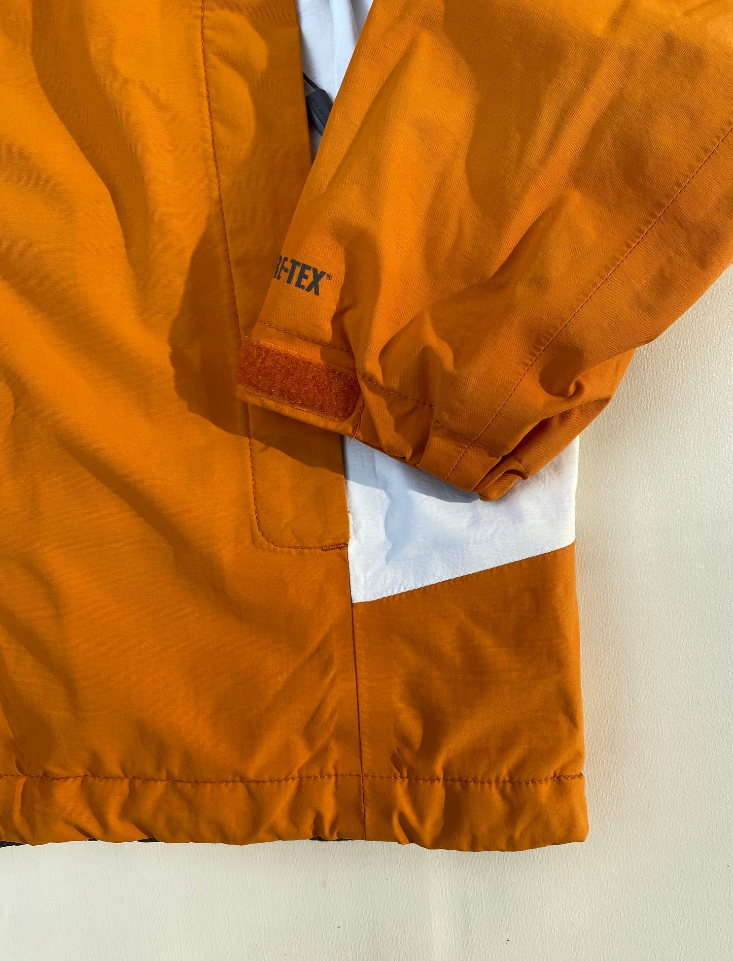 Veste goretex Salomon, orange/blanc/gris, M légèrement oversize