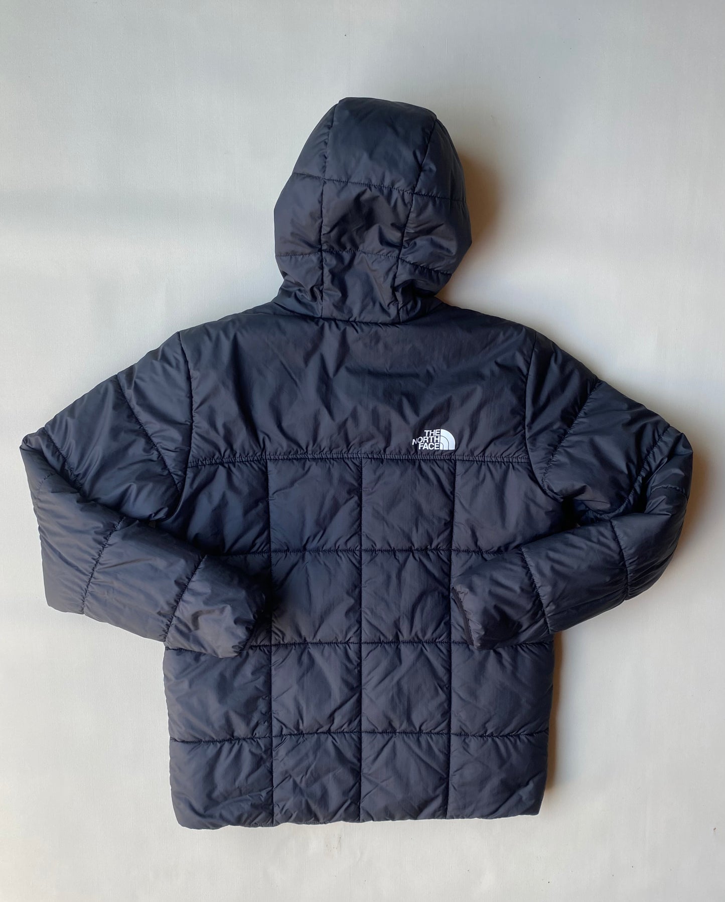 Doudoune réversible The North Face, noire, XL boys (M adulte)