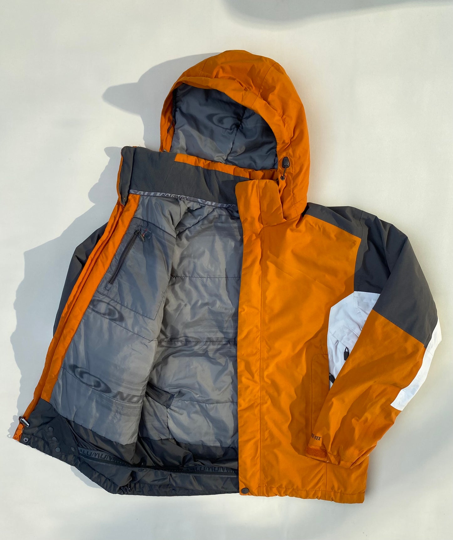 Veste goretex Salomon, orange/blanc/gris, M légèrement oversize