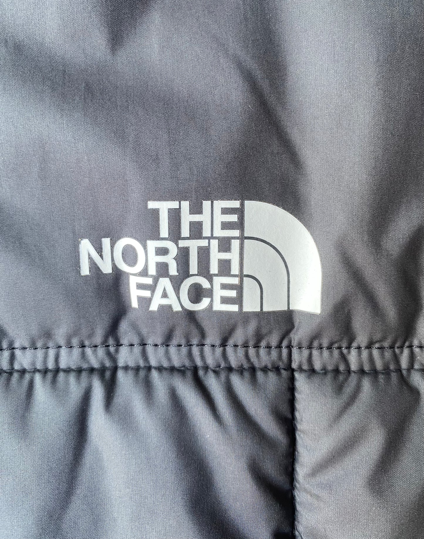 Doudoune réversible The North Face, noire, XL boys (M adulte)